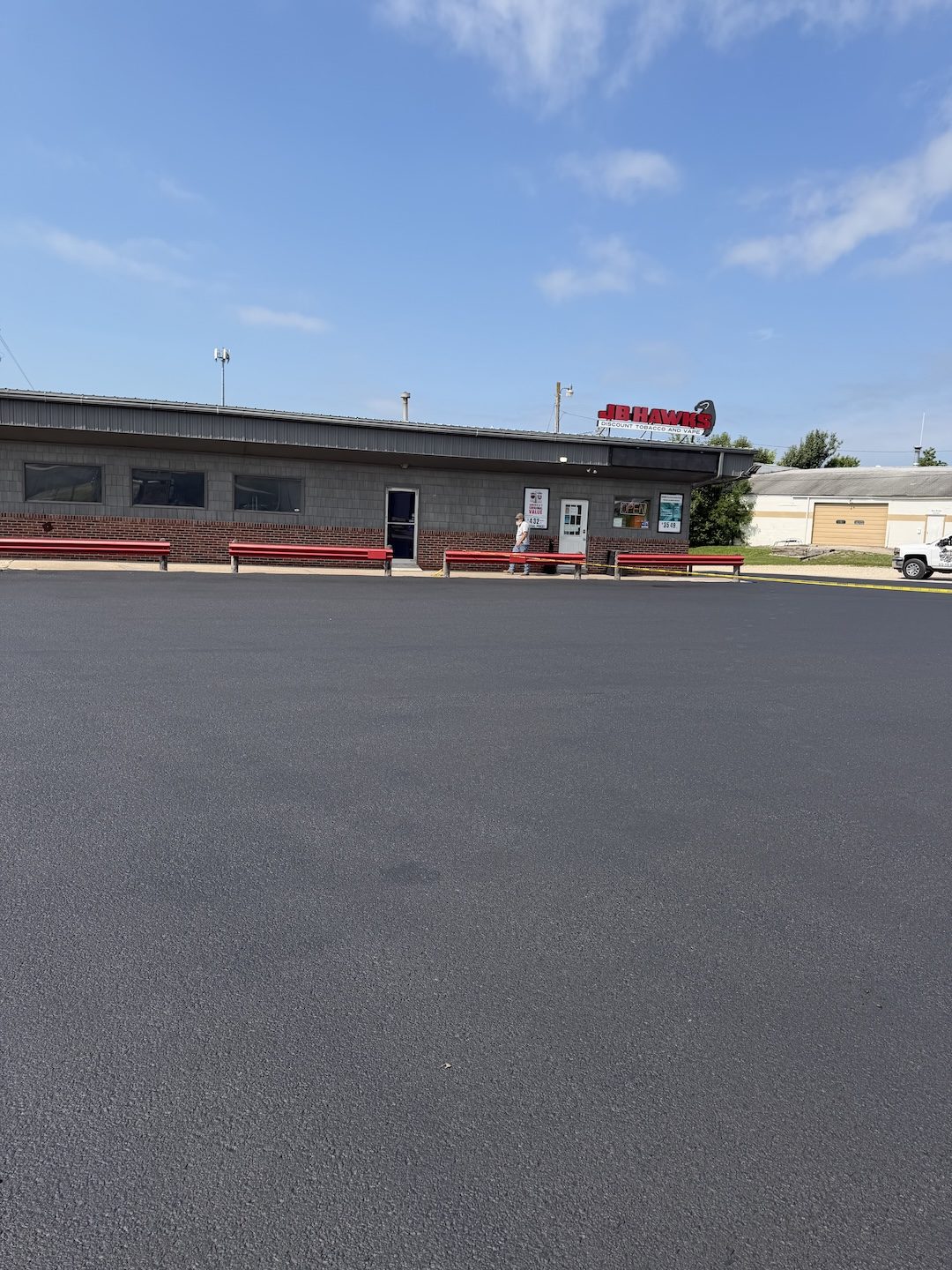 Paving convenience store lot by United Way Asphalt