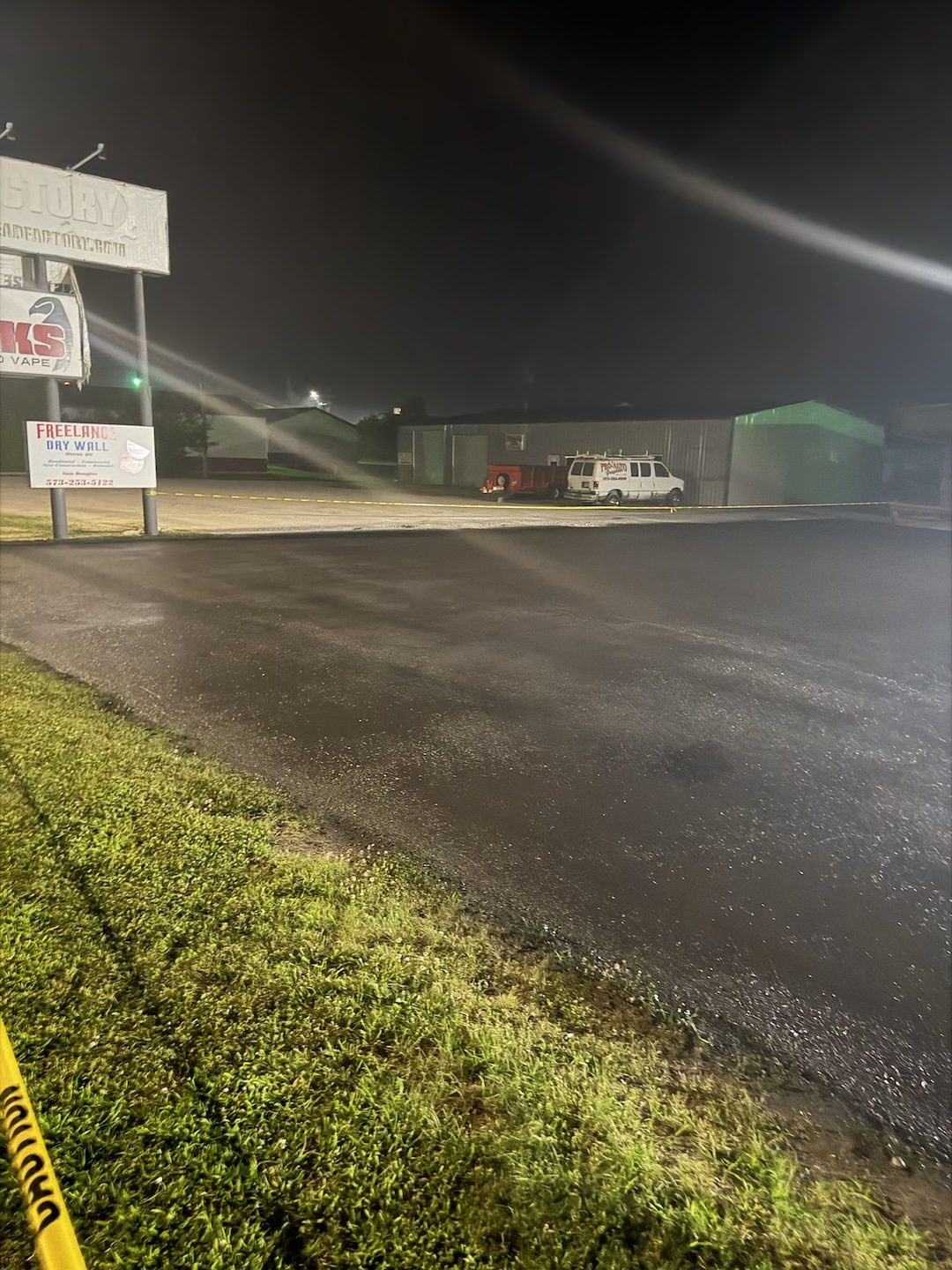 Commercial lot paving work performed after hours at night