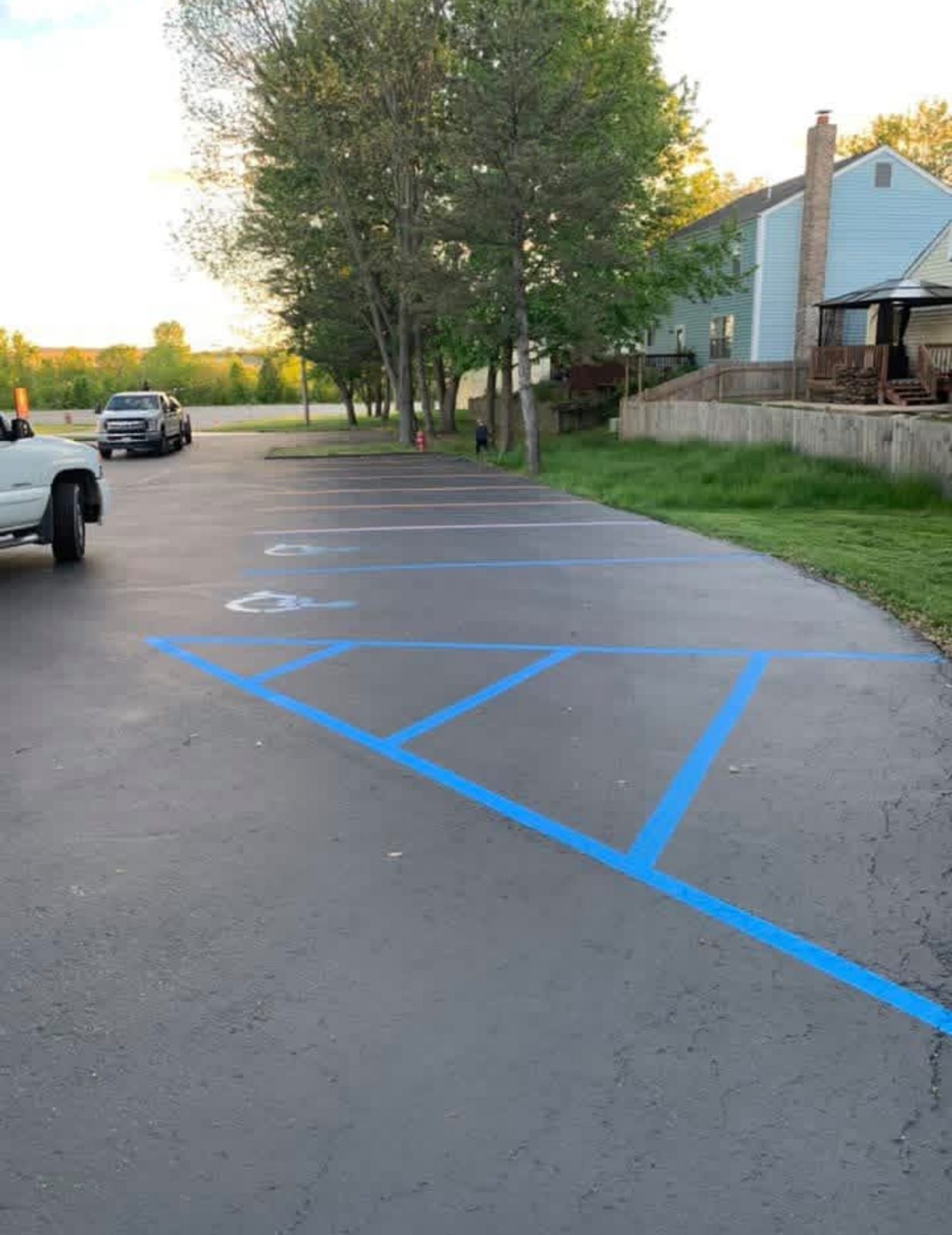 Parking lot with blue accessible stall markings