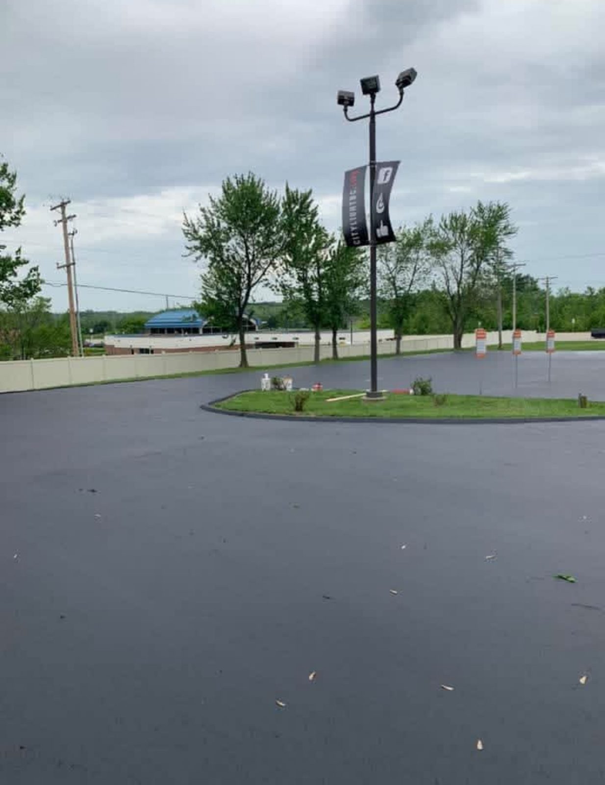 Paving large commercial lot by United Way Asphalt
