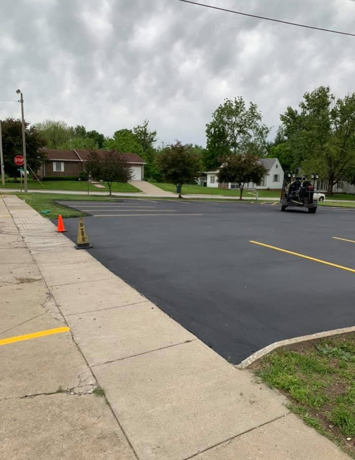 Striping yellow stalls by United Way Asphalt