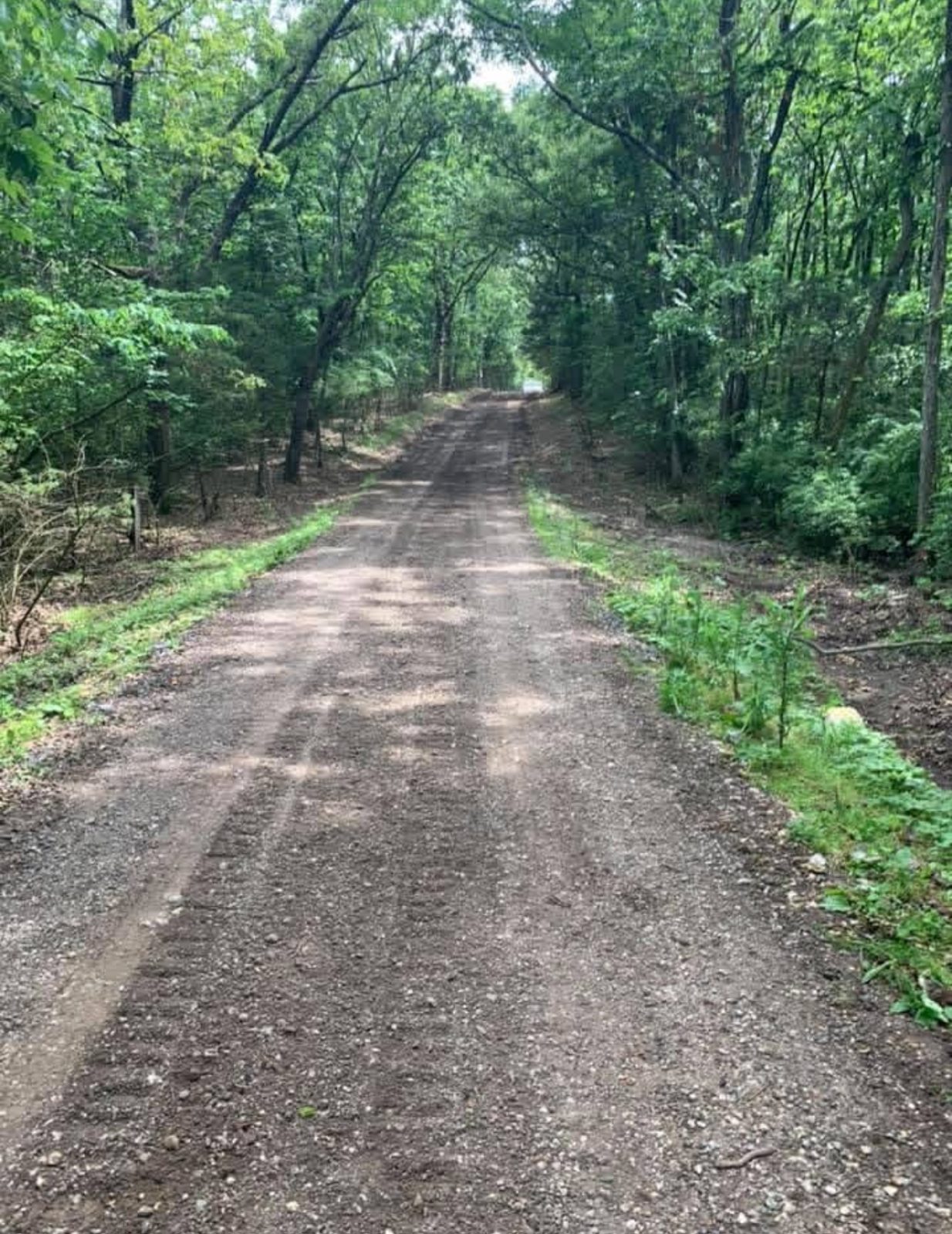 Before gravel lane prior to paving by United Way Asphalt